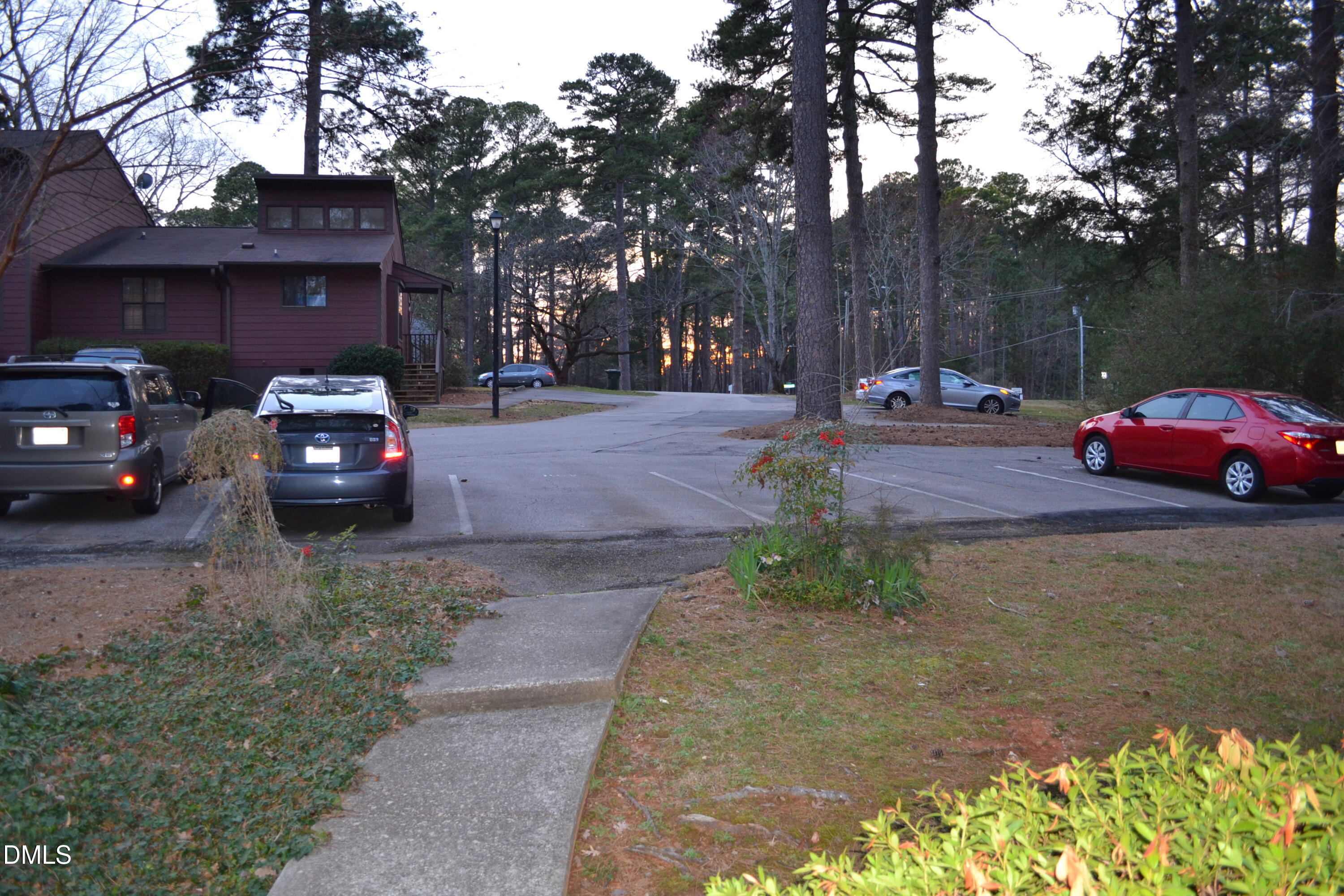 4018 The Oaks Drive Raleigh, NC 27606 - Photo 39 of 49 a car parked in front of a house