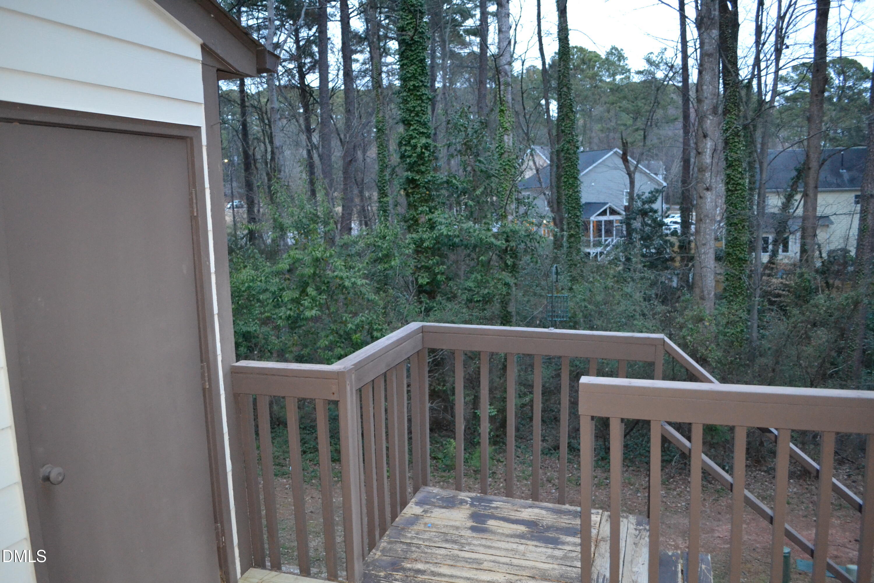 4018 The Oaks Drive Raleigh, NC 27606 - Photo 45 of 49 a view of a chair and table in the balcony