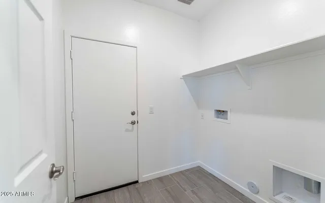 a view of small space with wooden floor