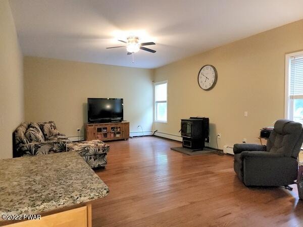 337 Layton Road Equinunk, PA 18417 - Photo 13 of 31 Living Room With Pellet Stove