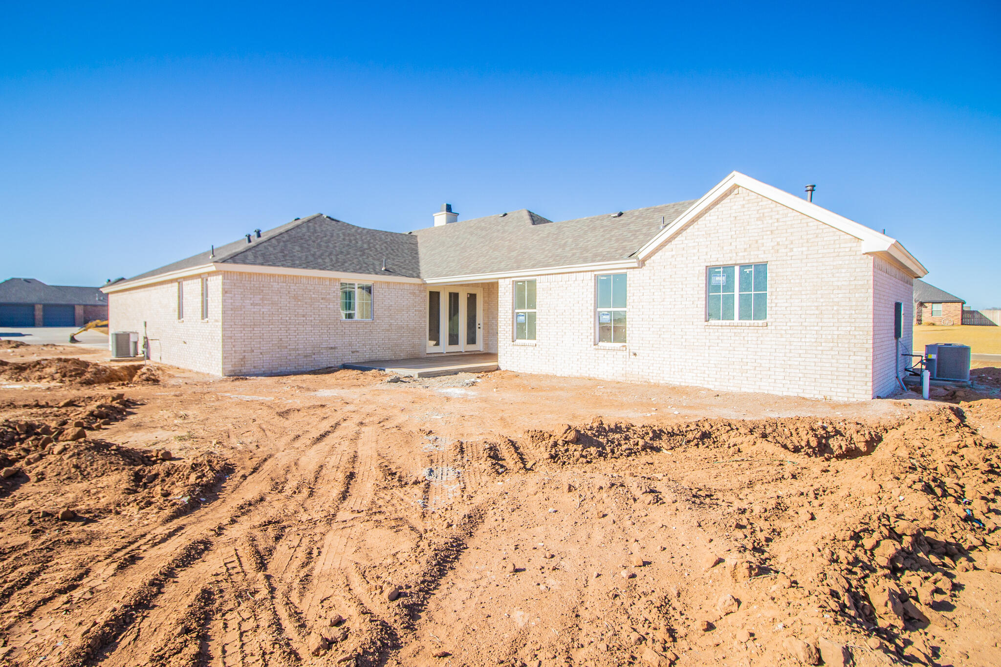 1011 County Road 7715 Lubbock, TX 79423 - Photo 20 of 20 a view of wooden house with a yard