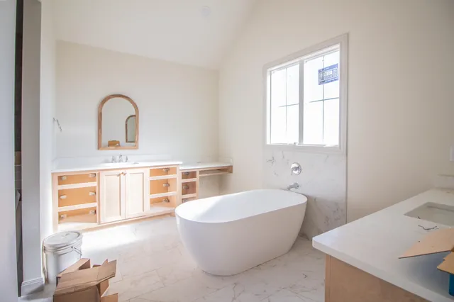 a large room with a window and bathroom