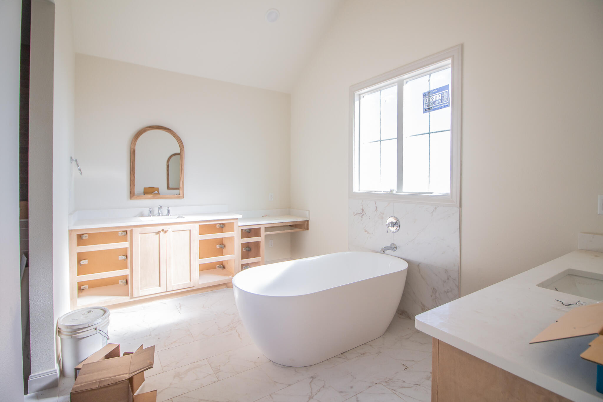 1011 County Road 7715 Lubbock, TX 79423 - Photo 8 of 20 a large room with a window and bathroom