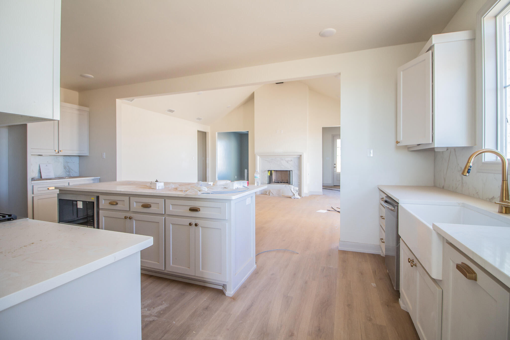 1011 County Road 7715 Lubbock, TX 79423 - Photo 9 of 20 a kitchen with a stove a sink and a refrigerator