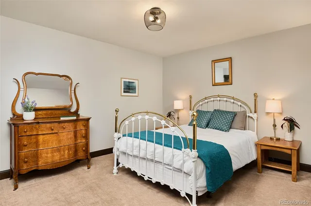 a room with pool table and windows