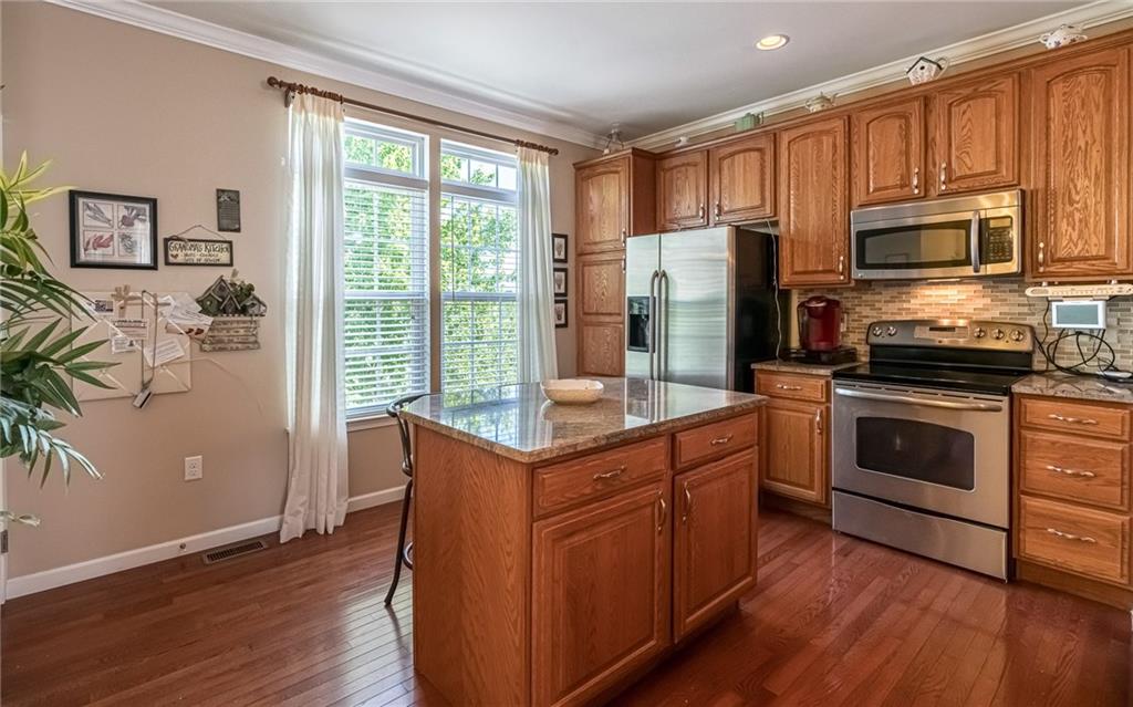 357 Wealdstone Road Cranberry Township, PA 16066 - Photo 6 of 25 Granite Counterops and Custom Backsplash in Kitchen