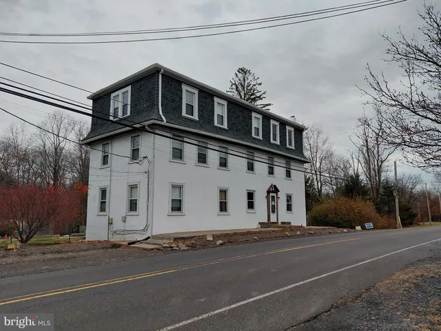 a view of a building on a street