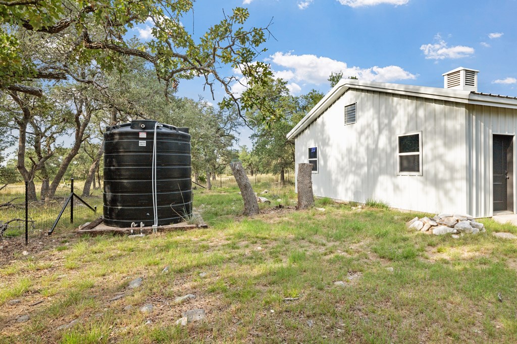 210 Dally Road Comfort, TX 78013 - Photo 57 of 79 Water Storage Tank behind Metal Building