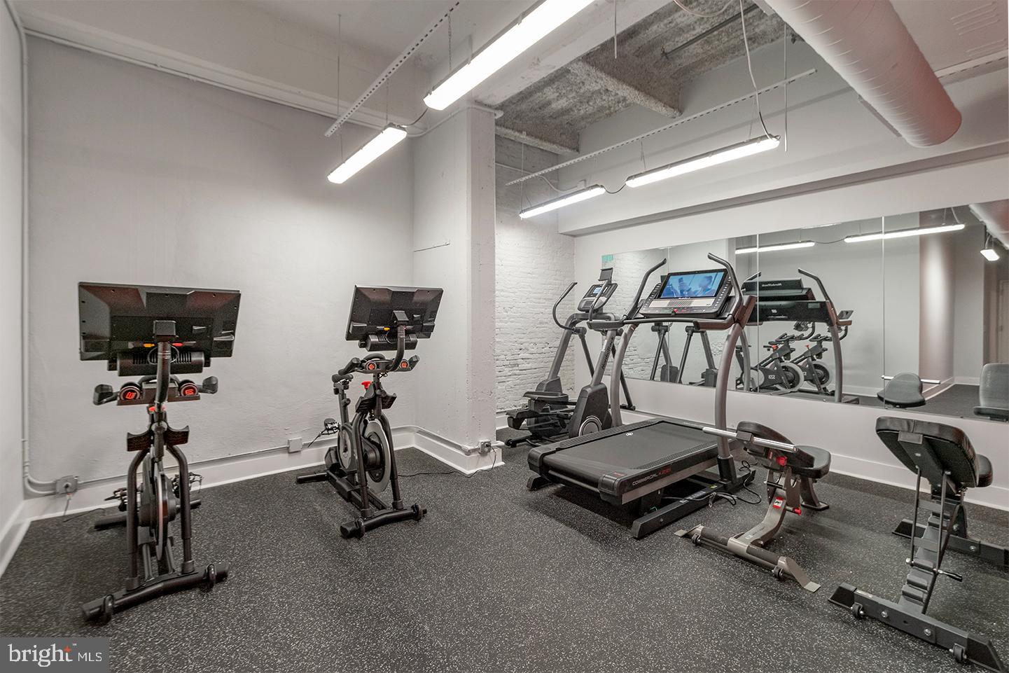 412 South 13th Street, Unit 307 Philadelphia, PA 19147 - Photo 9 of 16 a view of a room with gym equipment