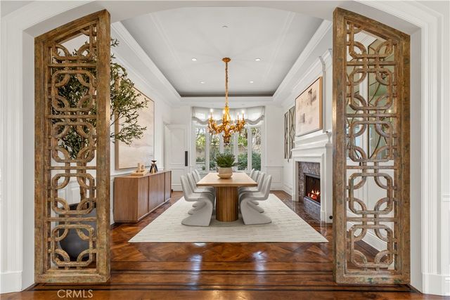 a view of living room with furniture and a fireplace