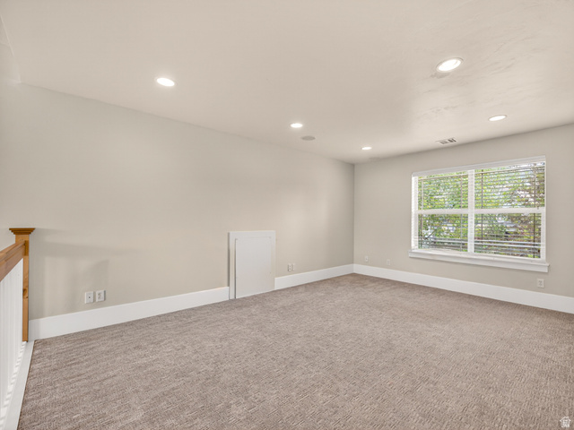 557 Craftsman Way Midway, UT 84049 - Photo 33 of 59 Spacious loft space featuring carpeted flooring and recessed lighting