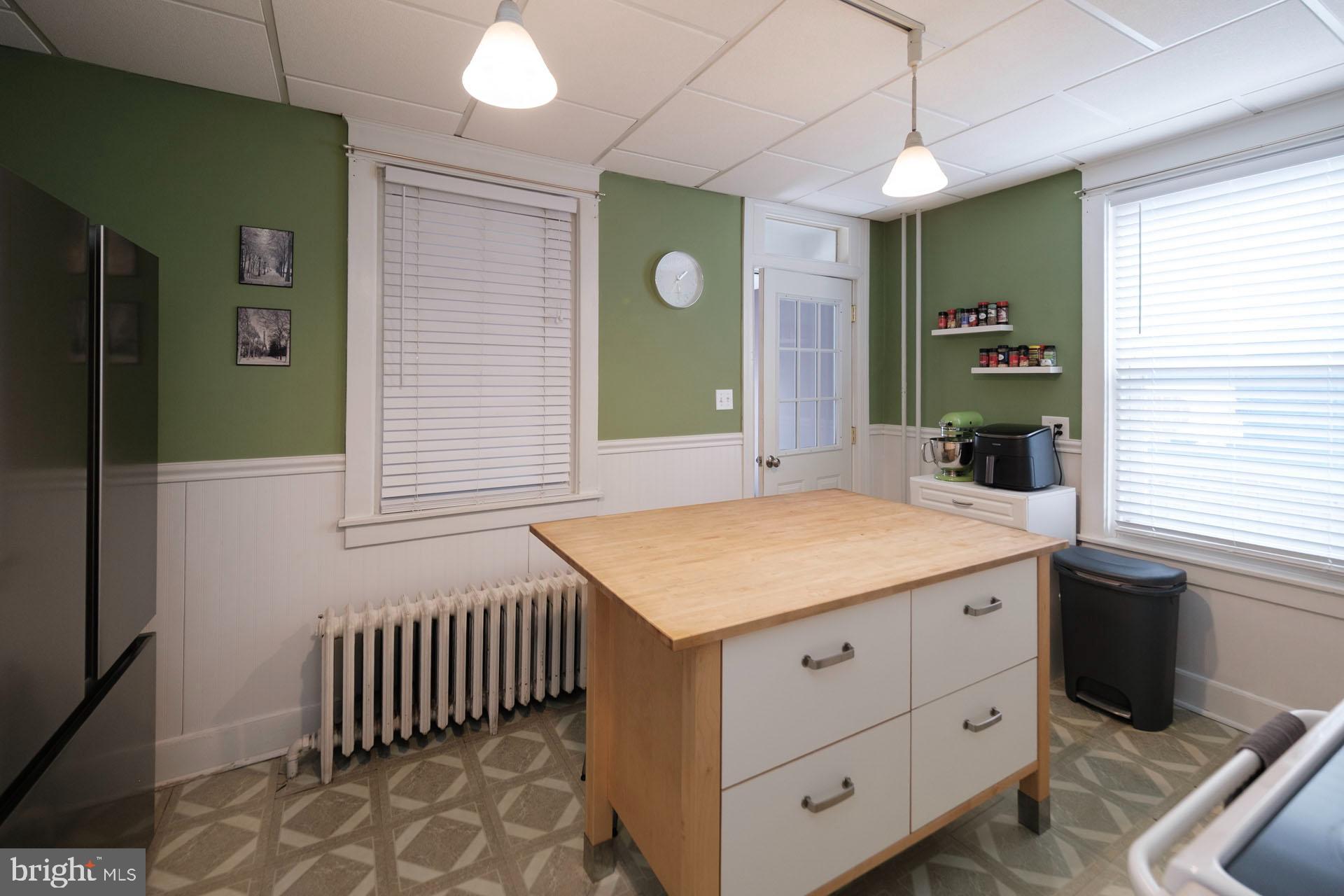 41 North Carroll Street Reading, PA 19611 - Photo 11 of 33 a bathroom with a granite countertop sink and a mirror
