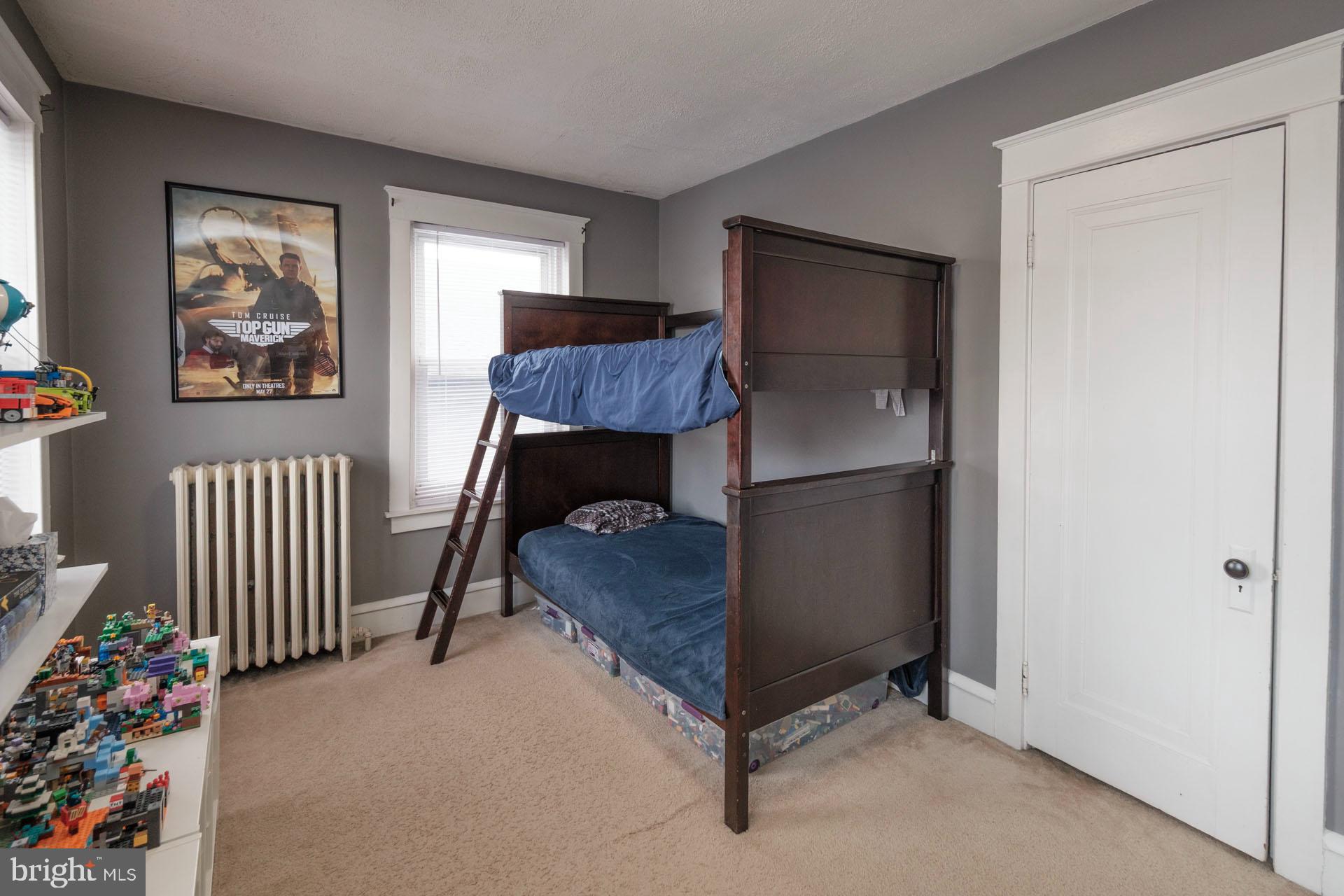 41 North Carroll Street Reading, PA 19611 - Photo 16 of 33 a bedroom with a bed and a window