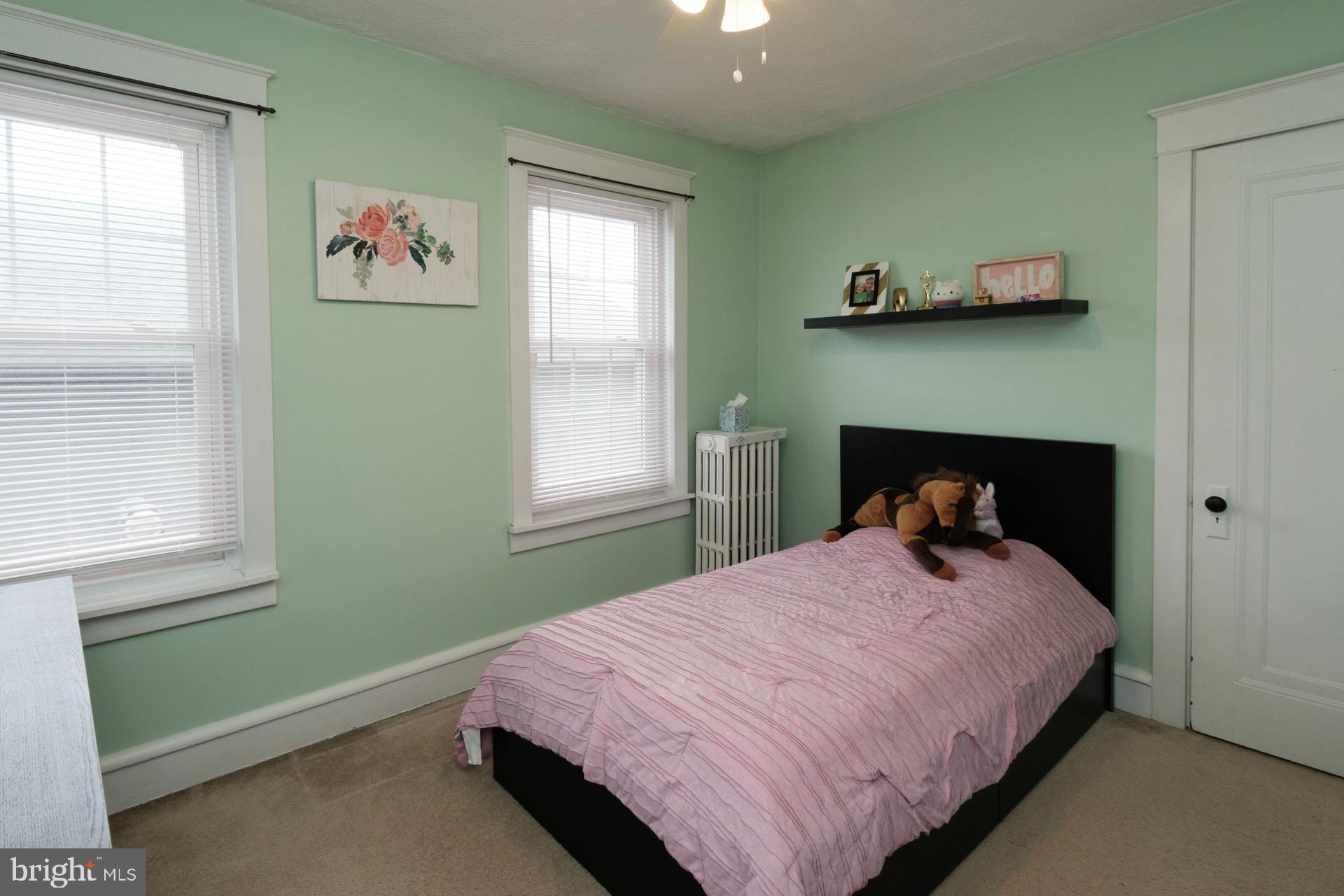 41 North Carroll Street Reading, PA 19611 - Photo 19 of 33 a bedroom with a bed and window