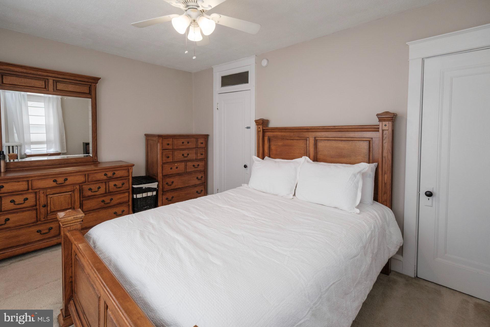 41 North Carroll Street Reading, PA 19611 - Photo 21 of 33 a bedroom with a large bed and a dresser