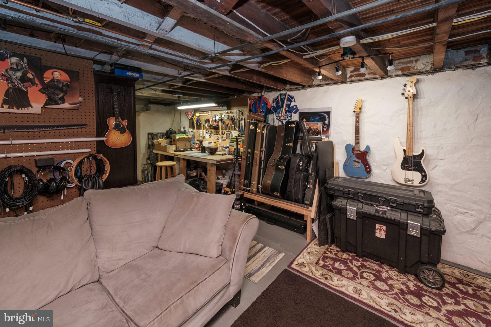 41 North Carroll Street Reading, PA 19611 - Photo 28 of 33 a view of water heater room with wooden floor