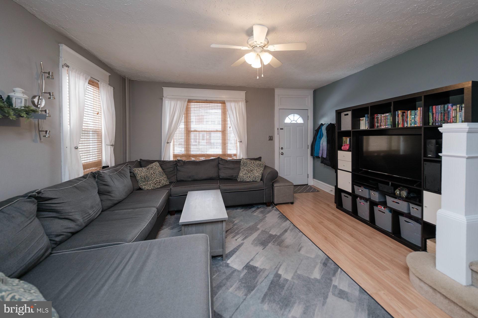 41 North Carroll Street Reading, PA 19611 - Photo 4 of 33 a living room with furniture and a flat screen tv
