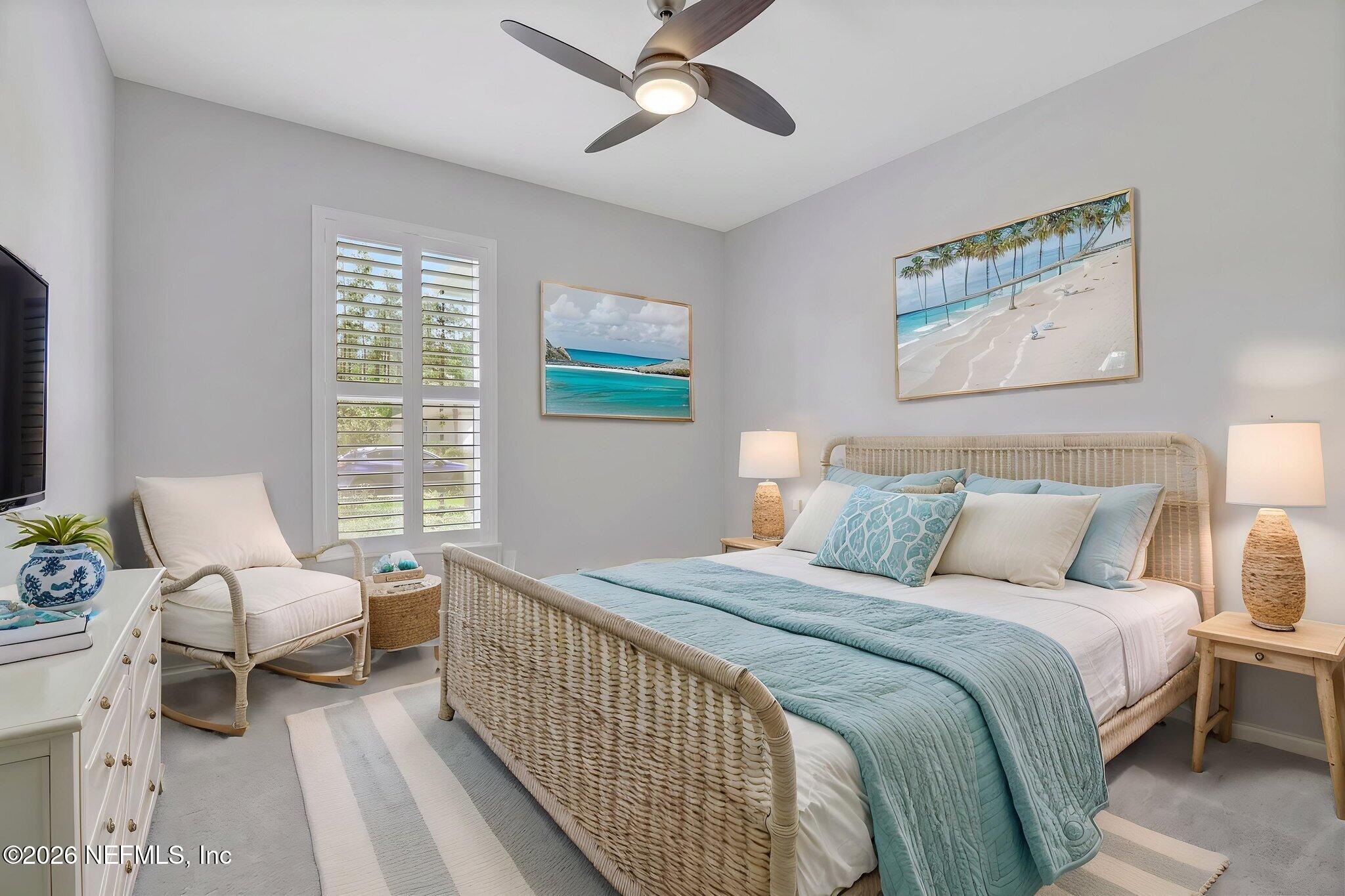 146 Clarendon Road St. Johns, FL 32259 - Photo 37 of 59 a bedroom with a bed and a chandelier