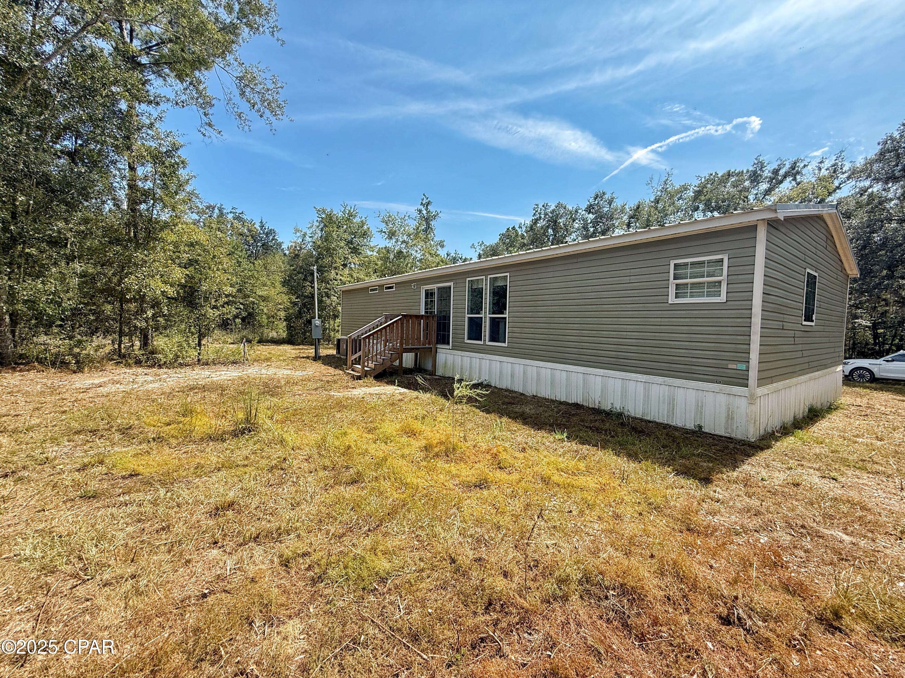 1818 Kaham Lane Grand Ridge, FL 32442 - Photo 6 of 30