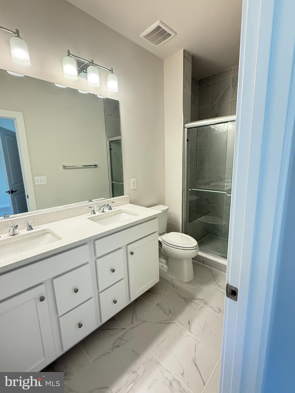 2108 Acadia Road Herndon, VA 20170 - Photo 11 of 21 Modern bathroom with sleek finishes.