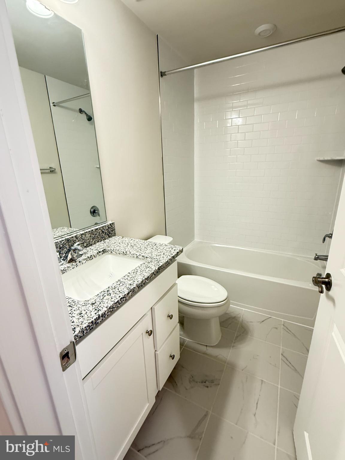 2108 Acadia Road Herndon, VA 20170 - Photo 18 of 21 Modern bathroom with sleek finishes.