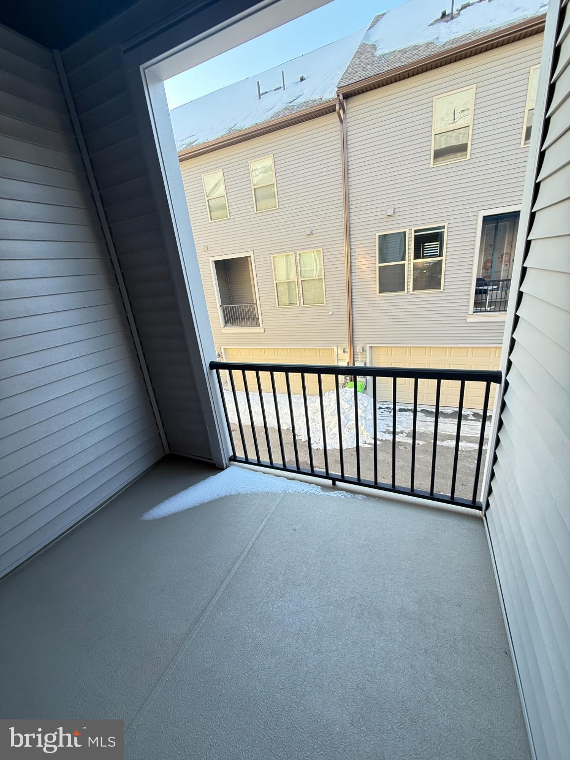 2108 Acadia Road Herndon, VA 20170 - Photo 9 of 21 Bright balcony next to the dinig with urban views.