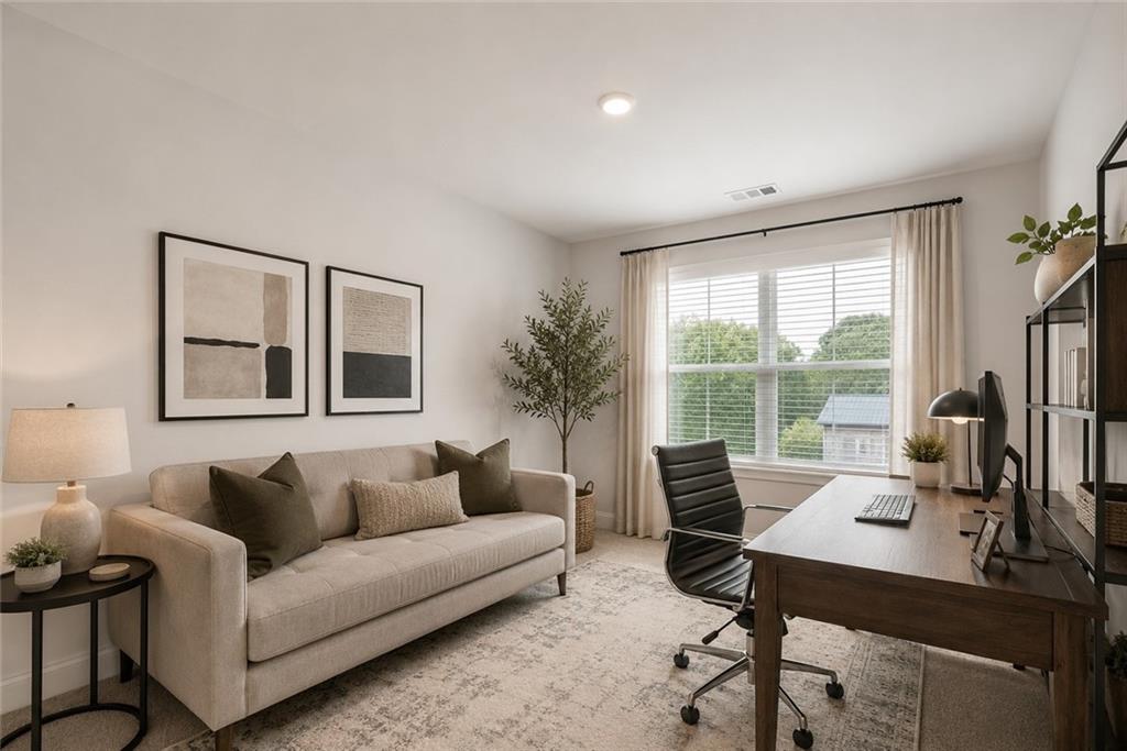 3334 Swallowtail Terrace Duluth, GA 30096 - Photo 31 of 37 a living room with furniture and a window