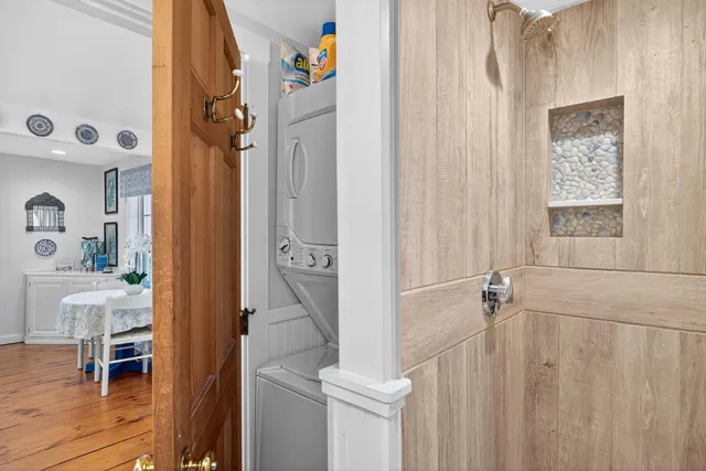 a view of entryway with wooden floor