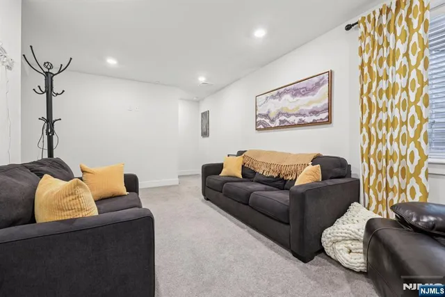 a living room with furniture and a couch