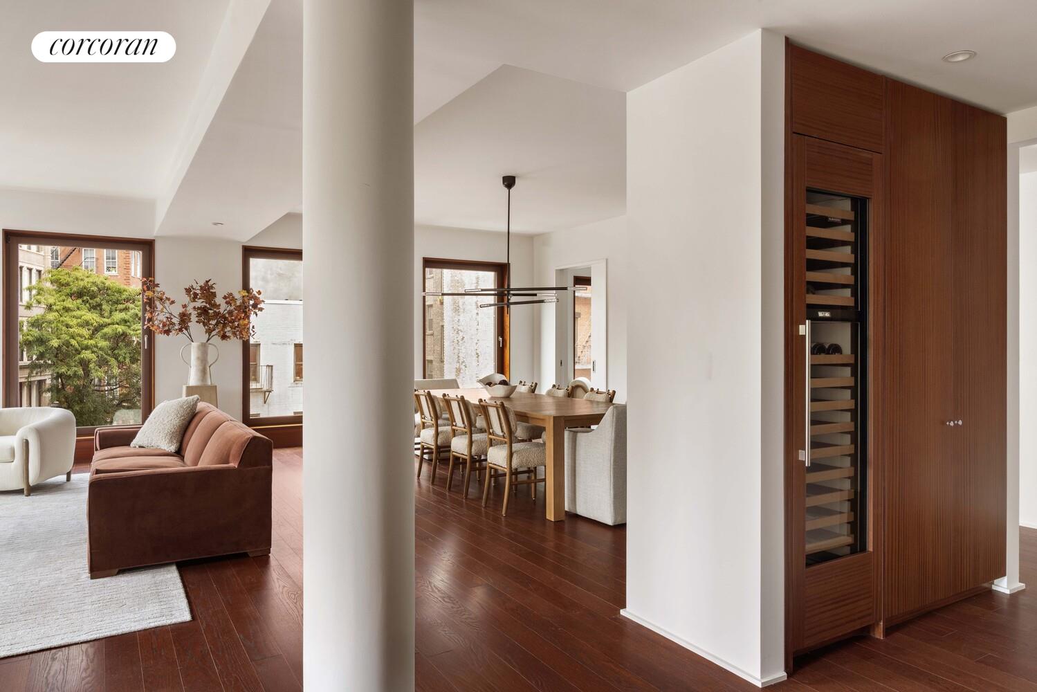 83 Thompson Street, Unit 5 Manhattan, NY 10012 - Photo 11 of 31 a view of a livingroom with furniture and hardwood floor