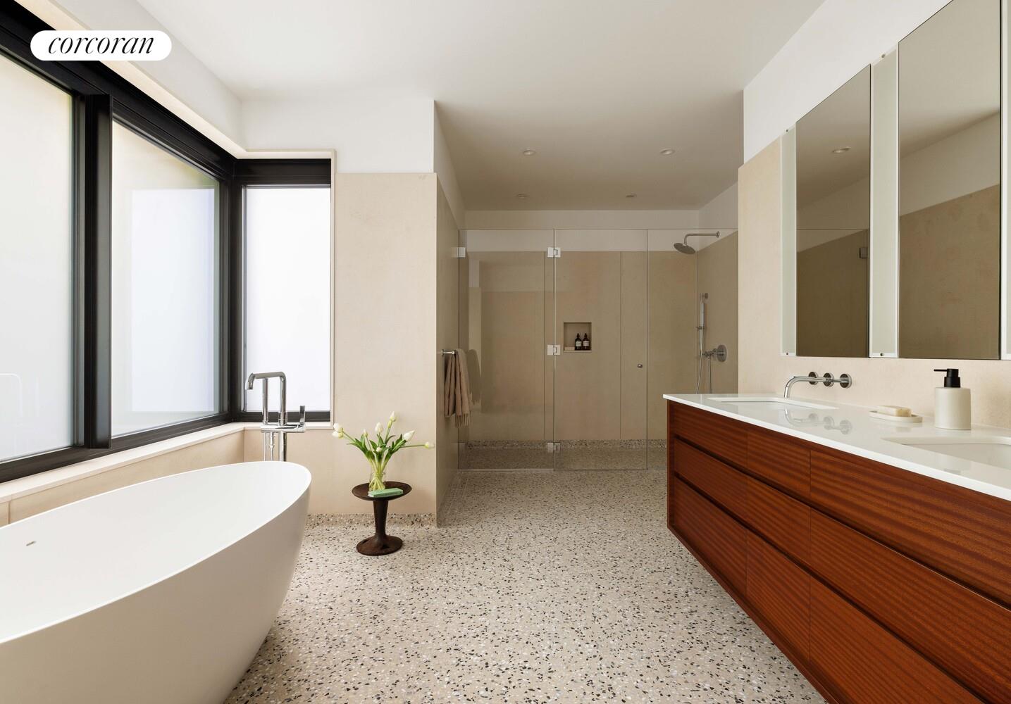 83 Thompson Street, Unit 5 Manhattan, NY 10012 - Photo 17 of 31 a bathroom with a bathtub and a sink