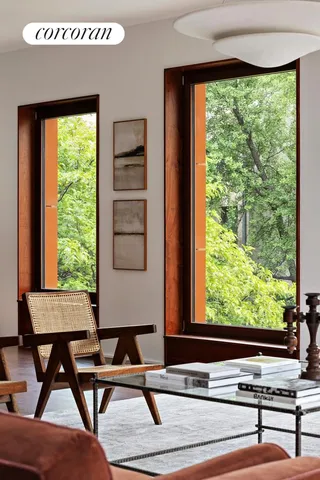 a workspace with furniture and window