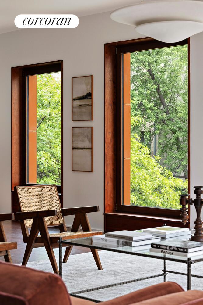 83 Thompson Street, Unit 5 Manhattan, NY 10012 - Photo 4 of 31 a room with furniture and window