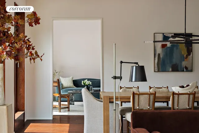 a view of a dining room with furniture window and outside view