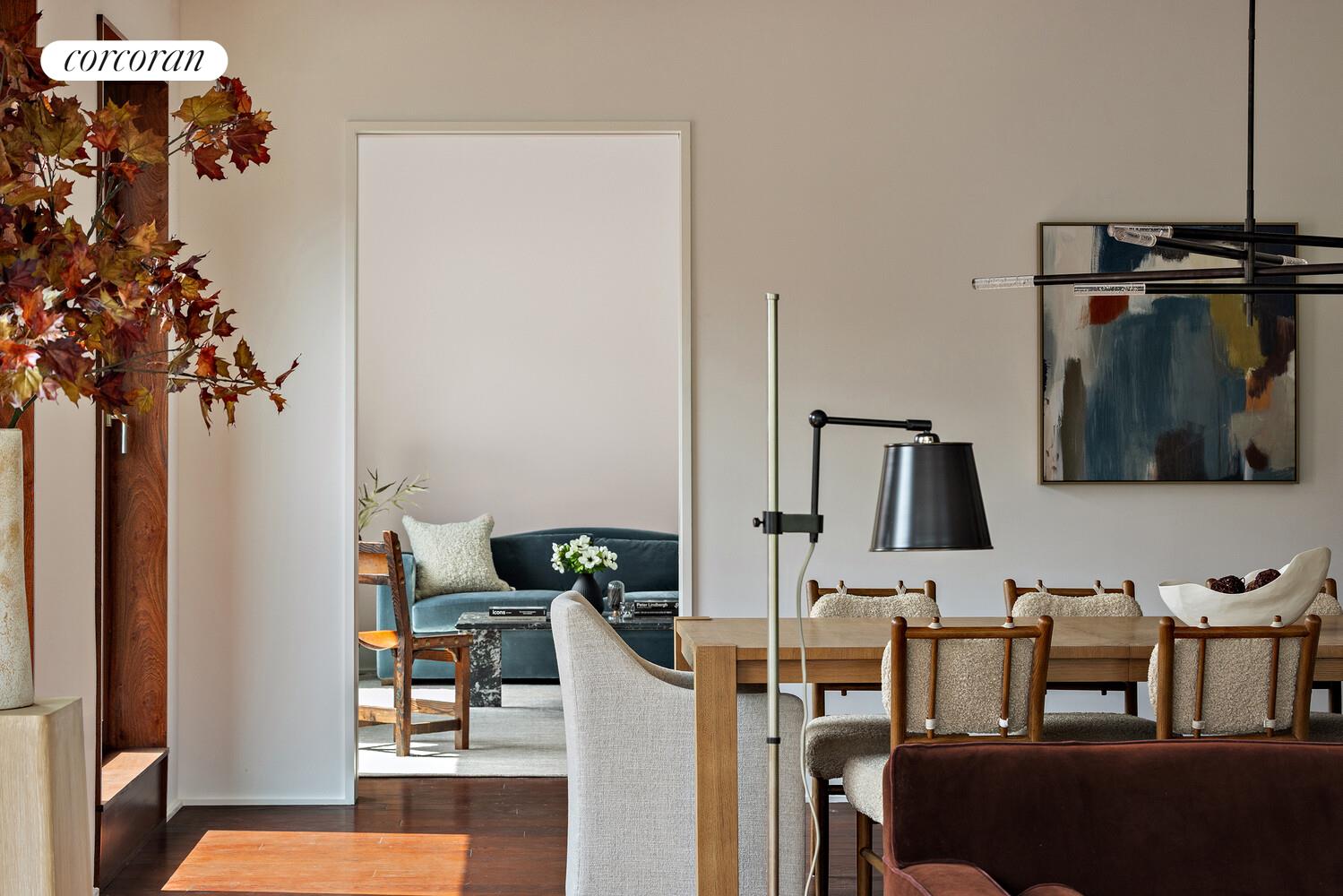 83 Thompson Street, Unit 5 Manhattan, NY 10012 - Photo 6 of 31 a living room with furniture and a potted plant