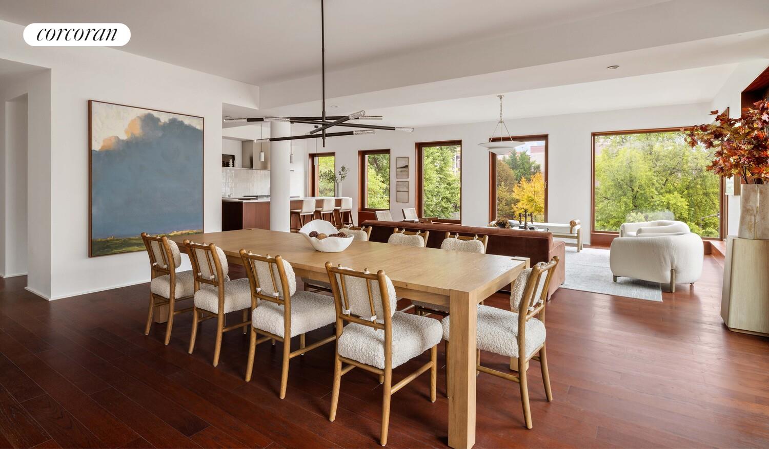 83 Thompson Street, Unit 5 Manhattan, NY 10012 - Photo 9 of 31 a view of a dining room with furniture window and wooden floor