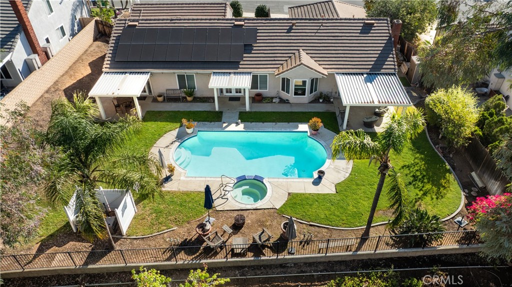 10451 Morning Ridge Drive Moreno Valley, CA 92557 - Photo 2 of 56 front view of house with a yard