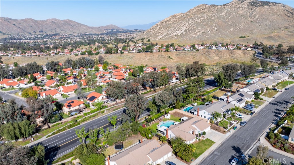 10451 Morning Ridge Drive Moreno Valley, CA 92557 - Photo 4 of 56 a view of a city with a lake