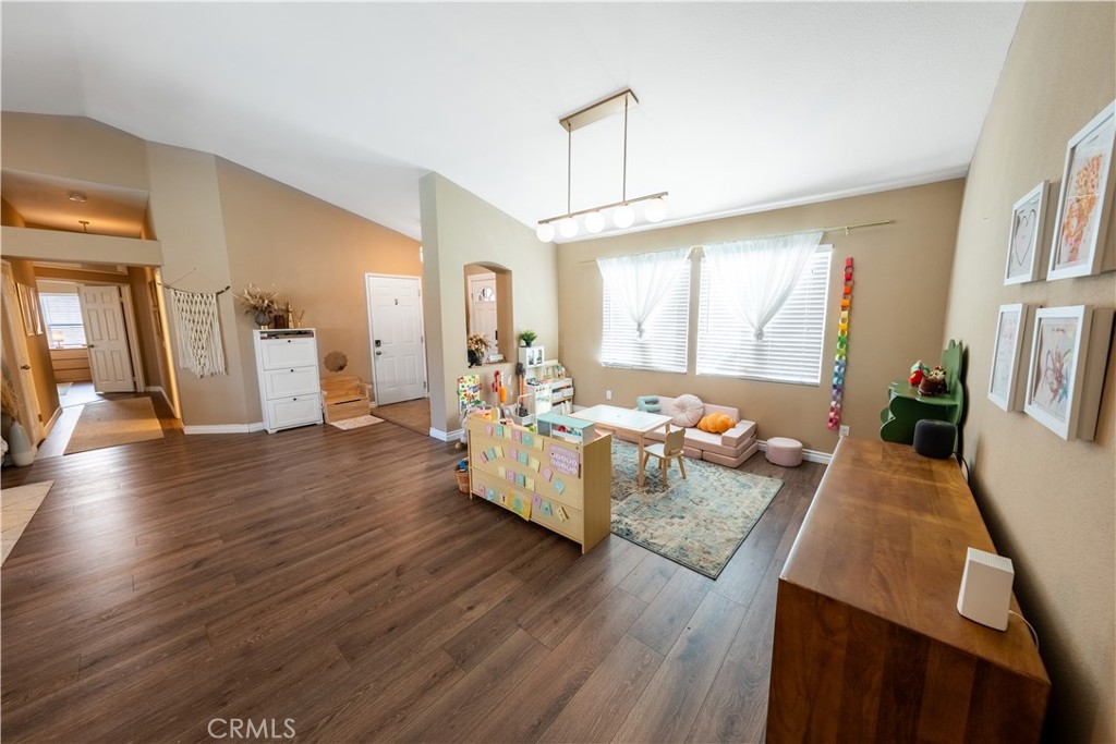 10451 Morning Ridge Drive Moreno Valley, CA 92557 - Photo 41 of 56 a living room with furniture and a large window