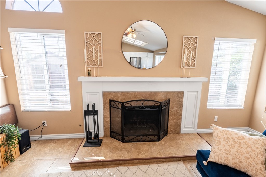 10451 Morning Ridge Drive Moreno Valley, CA 92557 - Photo 48 of 56 a living room with furniture and a fireplace