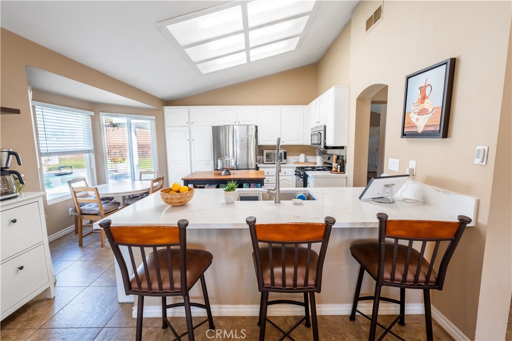 10451 Morning Ridge Drive Moreno Valley, CA 92557 - Photo 49 of 56 a view of a dining room with furniture window and outside view