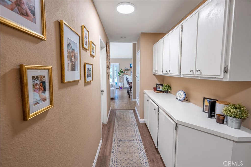 10451 Morning Ridge Drive Moreno Valley, CA 92557 - Photo 51 of 56 a kitchen with stainless steel appliances granite countertop a refrigerator and a sink