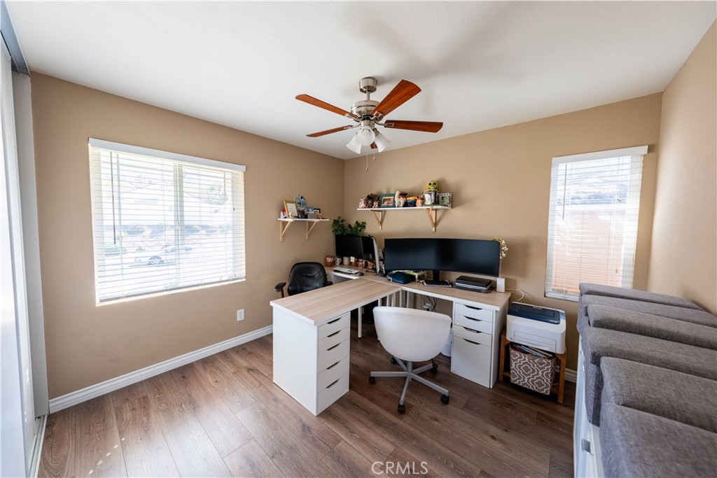 10451 Morning Ridge Drive Moreno Valley, CA 92557 - Photo 55 of 56 a workspace with furniture hardwood and a window