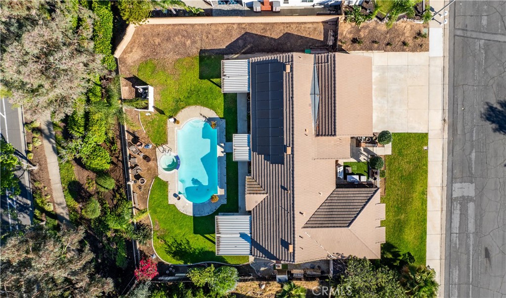 10451 Morning Ridge Drive Moreno Valley, CA 92557 - Photo 10 of 56 an aerial view of a house with a swimming pool