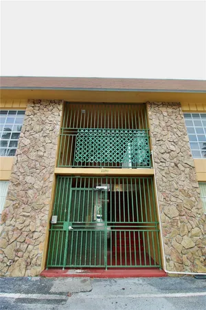 a view of balcony with wooden floor