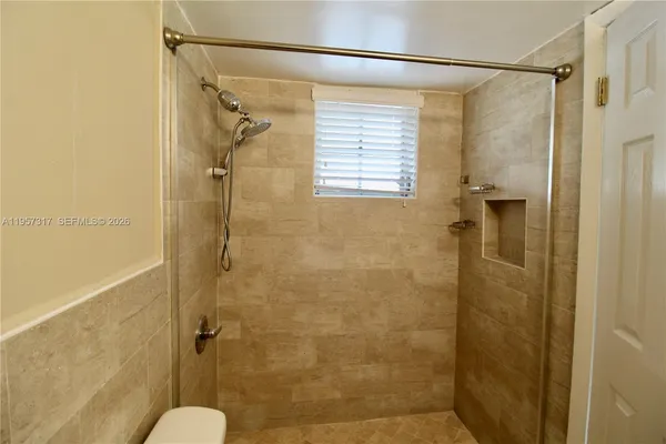a bathroom that has a shower in it