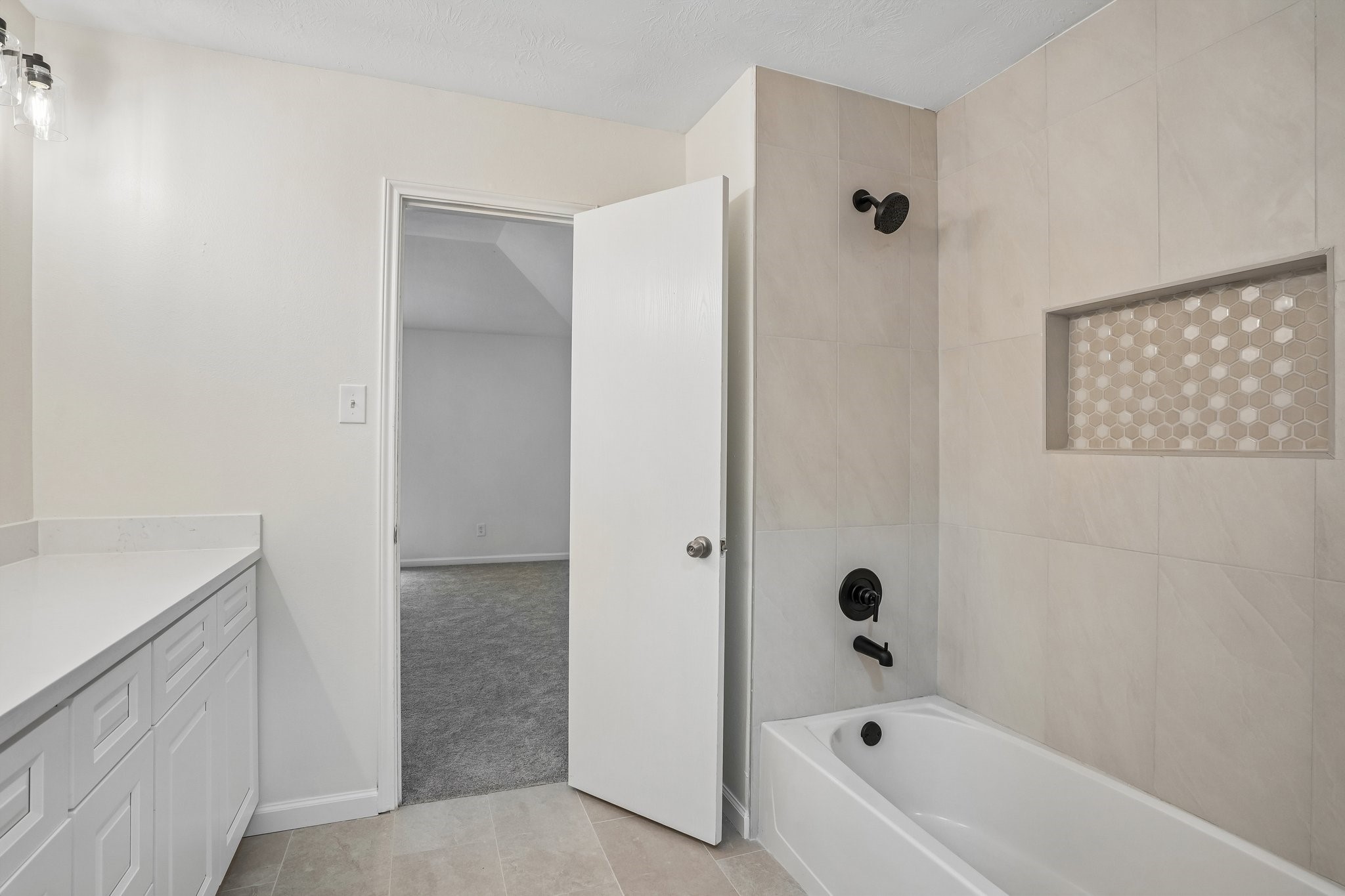 4419 Crossvine Avenue Baytown, TX 77521 - Photo 22 of 38 Another view of the primary bathroom.