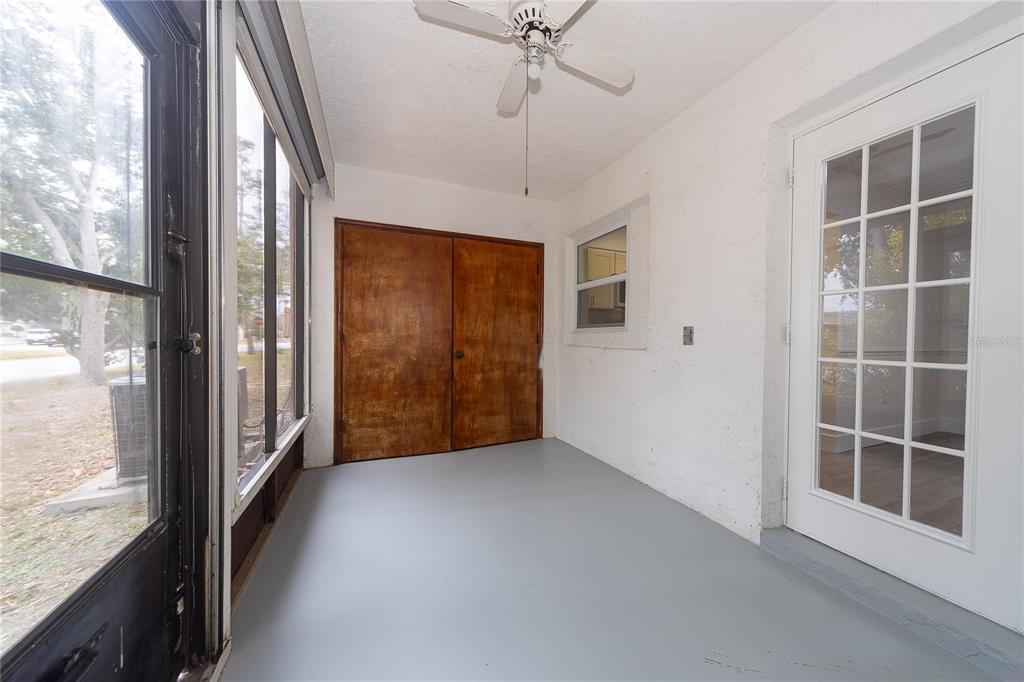 8557 Pilgrim Court New Port Richey, FL 34653 - Photo 13 of 29 a view of an empty room with a window