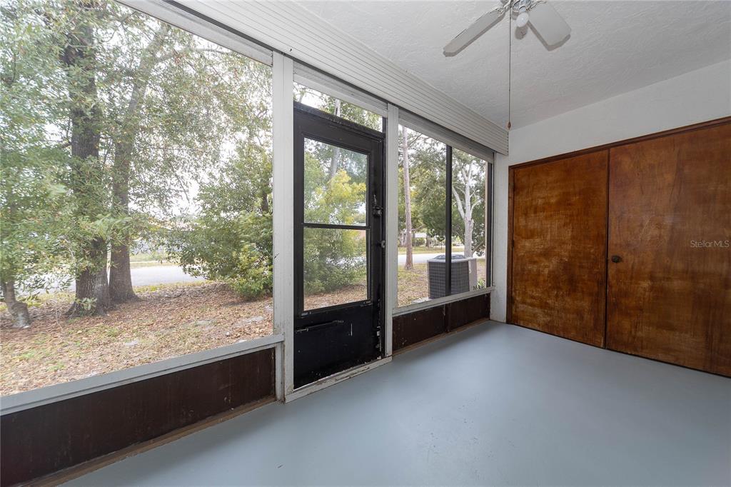 8557 Pilgrim Court New Port Richey, FL 34653 - Photo 15 of 29 a view of an empty room with a window