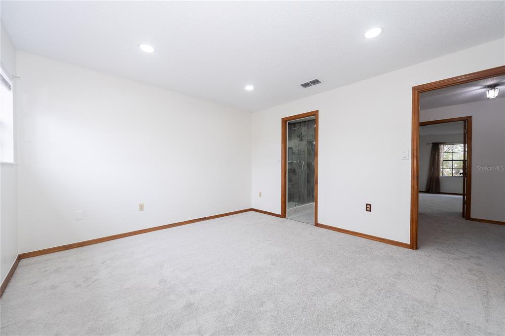 8557 Pilgrim Court New Port Richey, FL 34653 - Photo 19 of 29 an empty room with an entryway